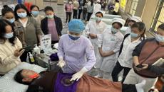 国壮赴天等县中医医院开展壮医护理技术推广交流